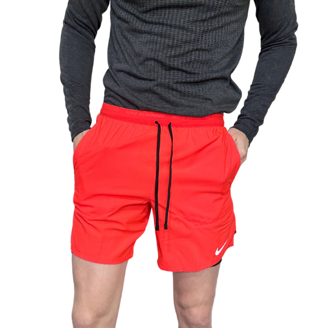 Nike flex store stride shorts red